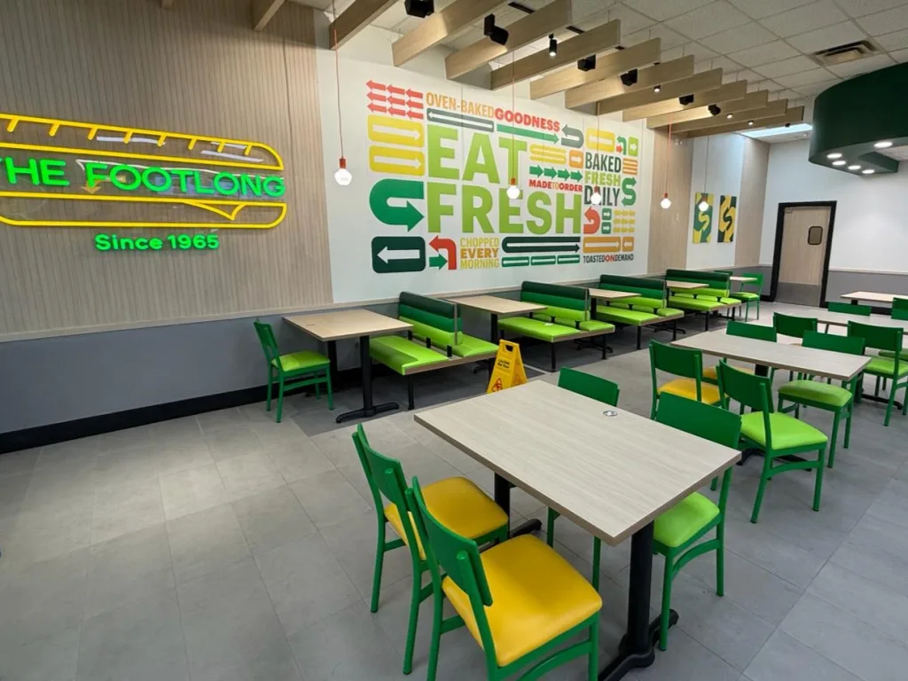 Commercial restaurant suite with seating, lighting, and interior finishes